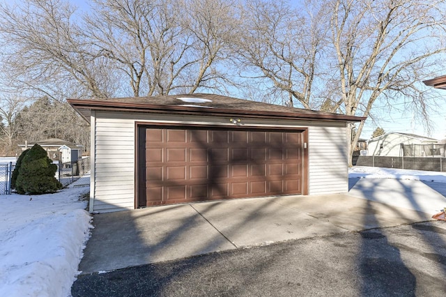 view of snow covered garage