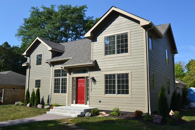 view of front of property with a front lawn