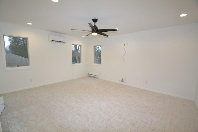 carpeted empty room with ceiling fan and an AC wall unit