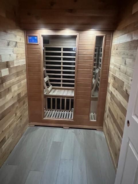 view of sauna featuring hardwood / wood-style floors