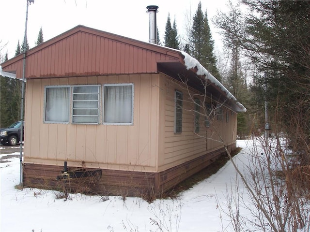 view of snow covered property