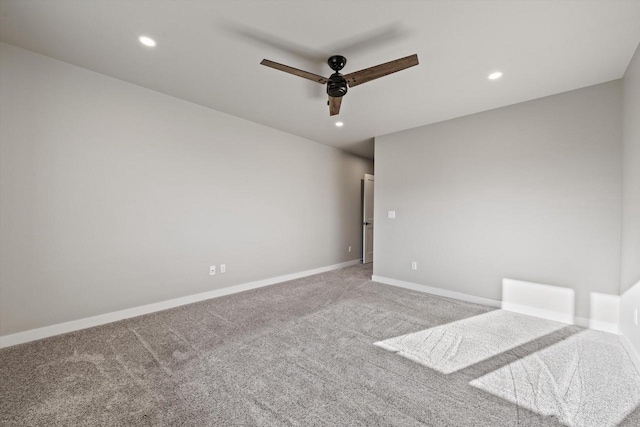 unfurnished bedroom featuring light colored carpet and ceiling fan