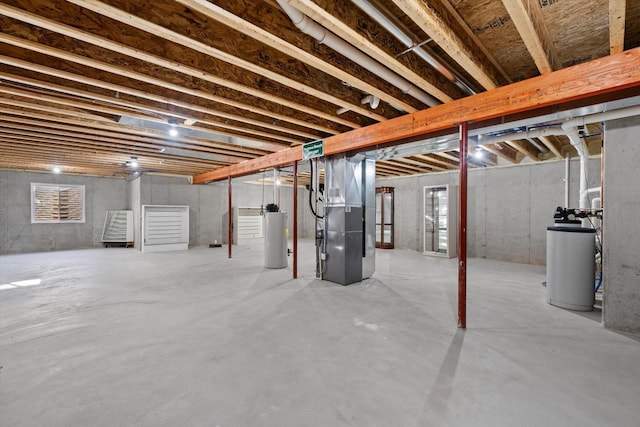 basement with gas water heater and heating unit