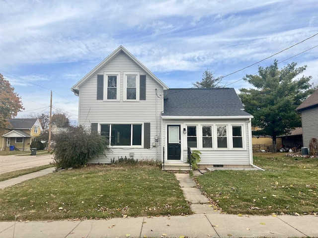 front facade with a front lawn