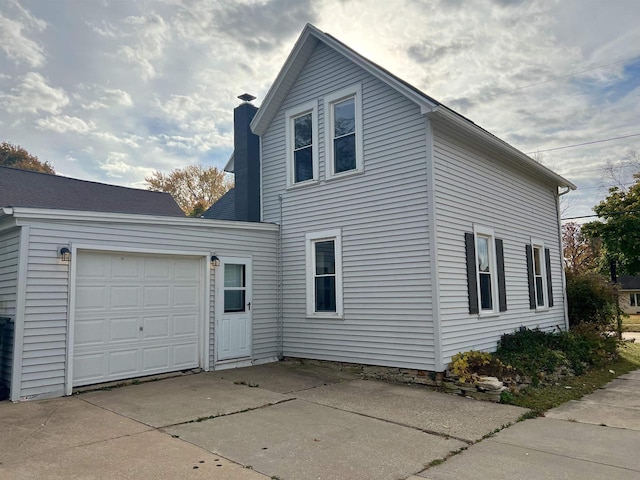 view of home's exterior featuring a garage