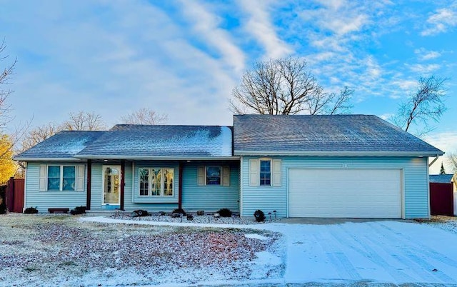 single story home featuring a garage