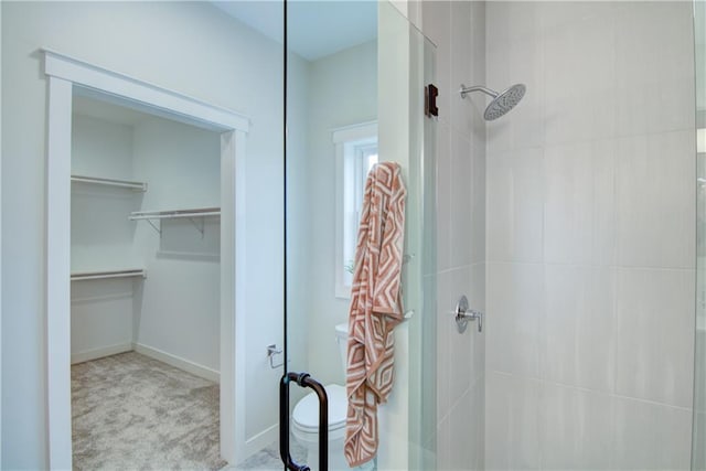 bathroom with tiled shower