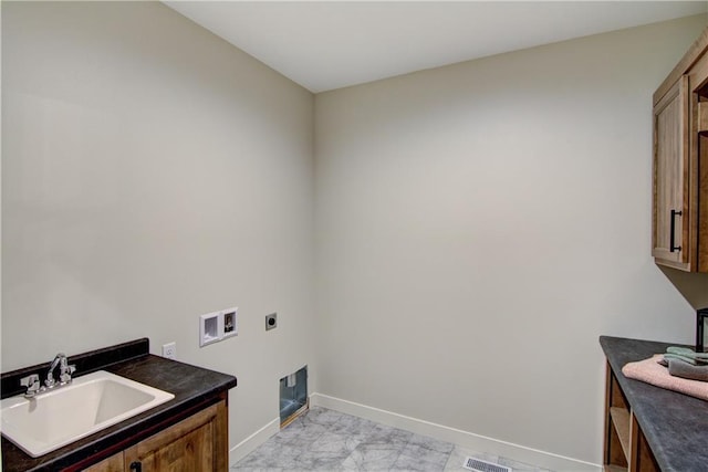 laundry room featuring sink, cabinets, electric dryer hookup, and washer hookup