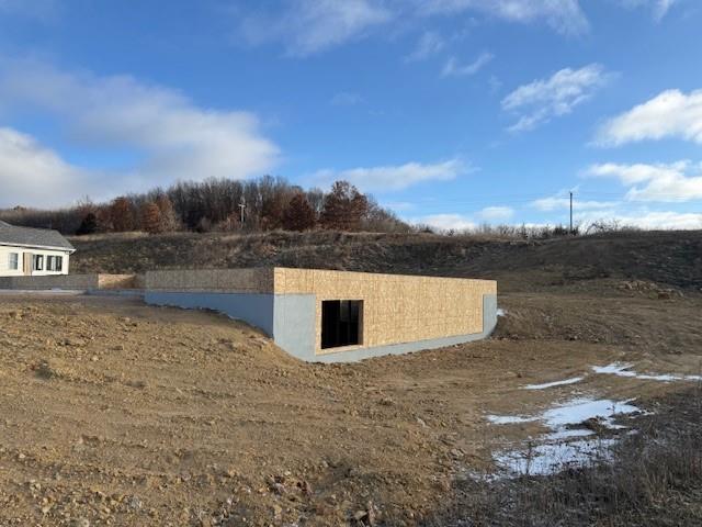 view of entry to storm shelter