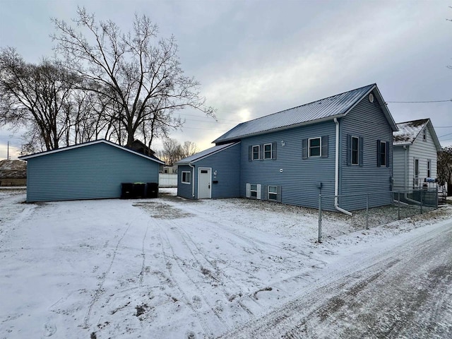 view of snow covered house