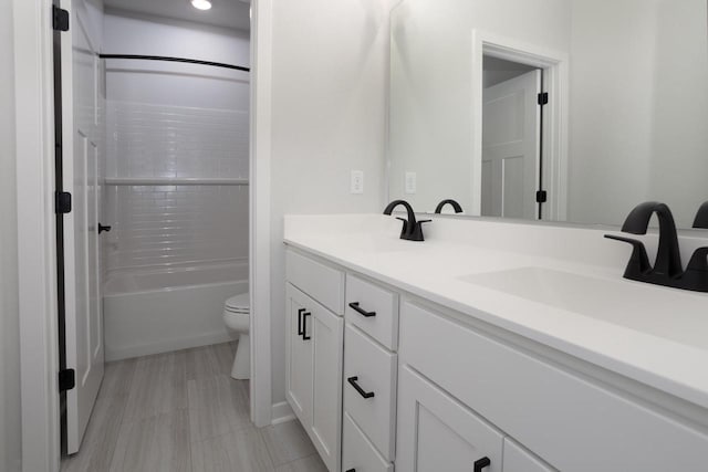 full bathroom with vanity, toilet, and tub / shower combination