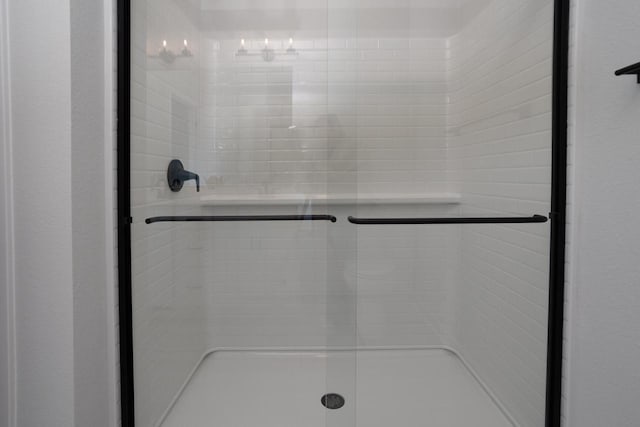 bathroom featuring walk in shower