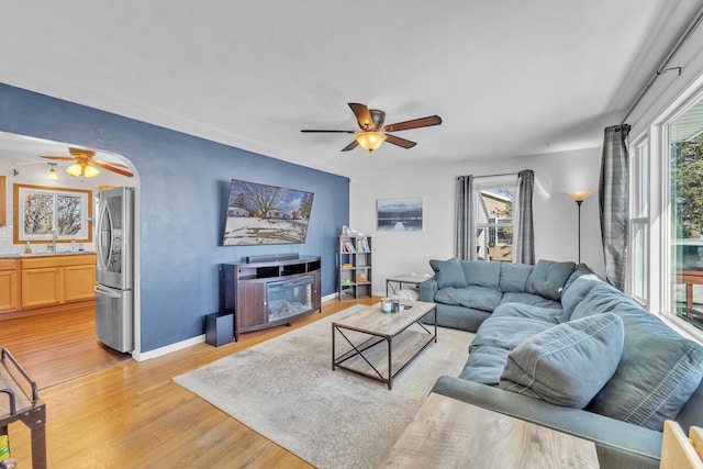 living room with light hardwood / wood-style flooring