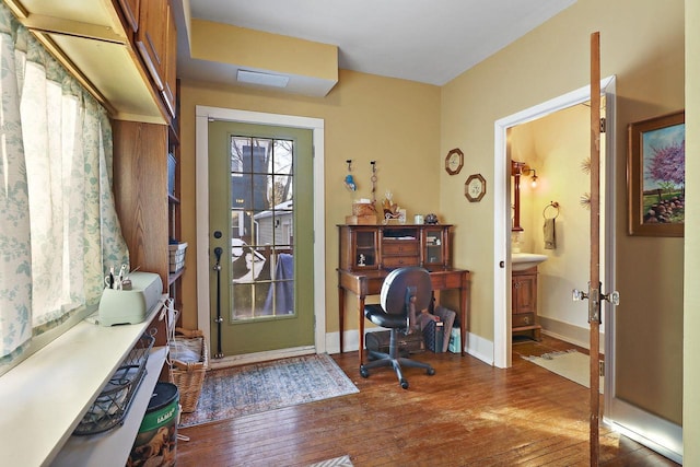 foyer entrance with dark hardwood / wood-style flooring