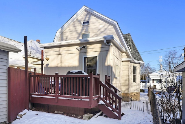 view of snow covered house