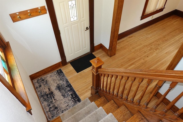 staircase featuring hardwood / wood-style flooring