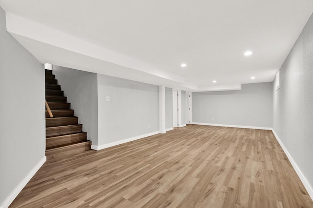 basement featuring light hardwood / wood-style flooring