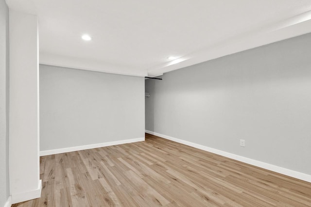 basement featuring light wood-type flooring