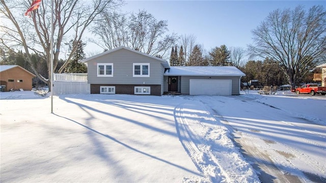 split level home featuring a garage