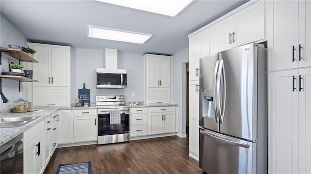 kitchen with sink, stainless steel appliances, dark hardwood / wood-style floors, and white cabinets