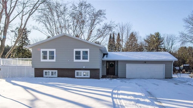 tri-level home featuring a garage