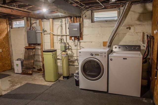 washroom featuring electric panel and washing machine and dryer