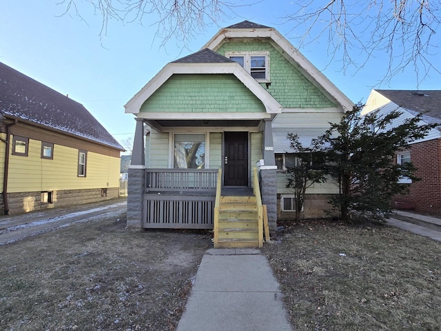 bungalow-style house featuring covered porch