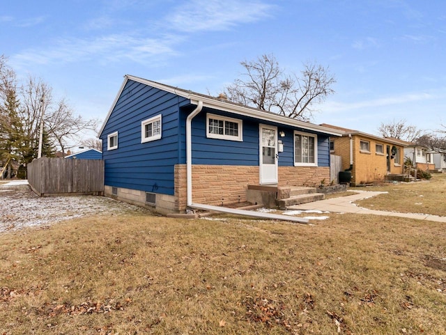 single story home with a front yard