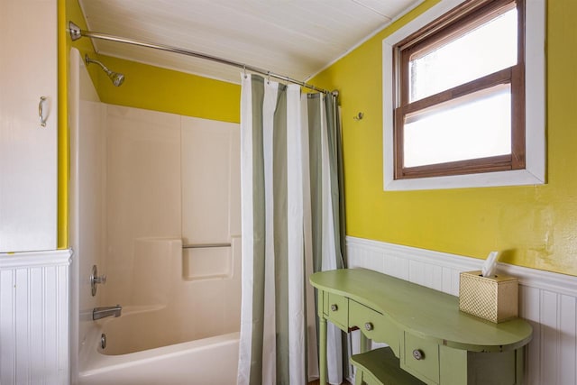 bathroom with radiator and shower / tub combo with curtain