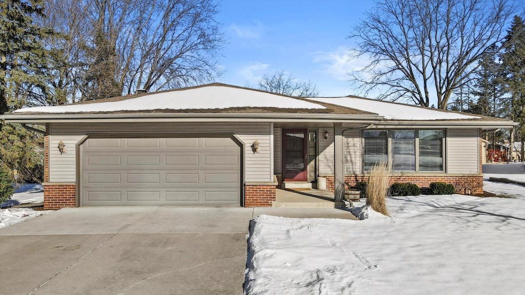 ranch-style home with a garage