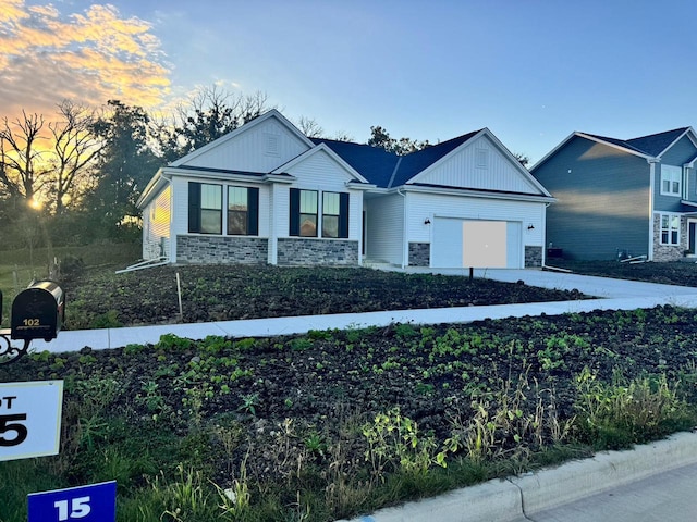 view of front of property featuring a garage