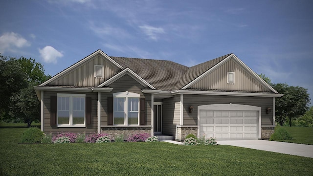 view of front of home featuring a garage and a front lawn