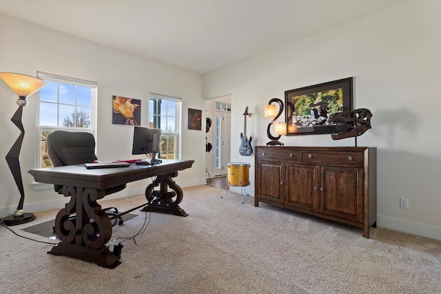 office space with light colored carpet