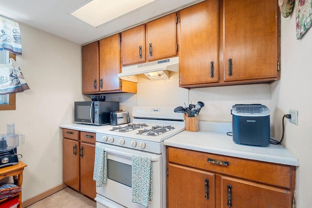 kitchen featuring white gas range oven