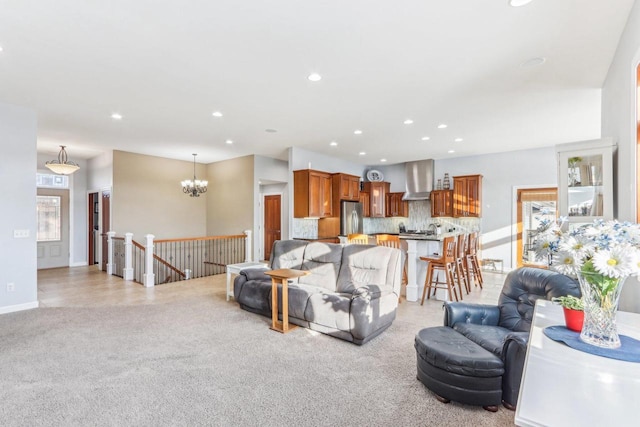 living room with an inviting chandelier