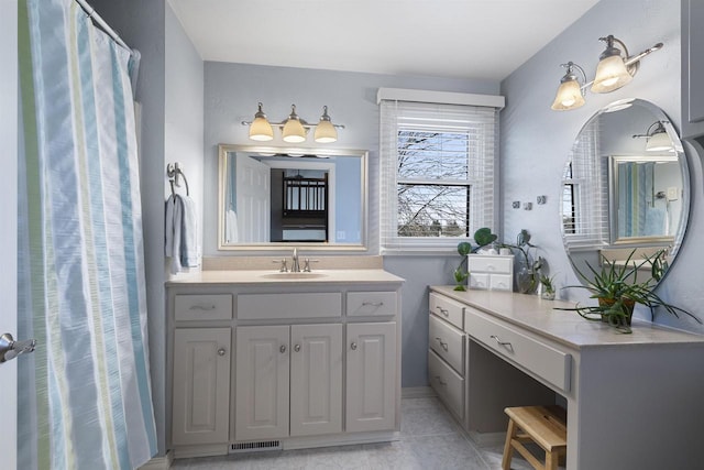 bathroom featuring vanity and tile patterned flooring