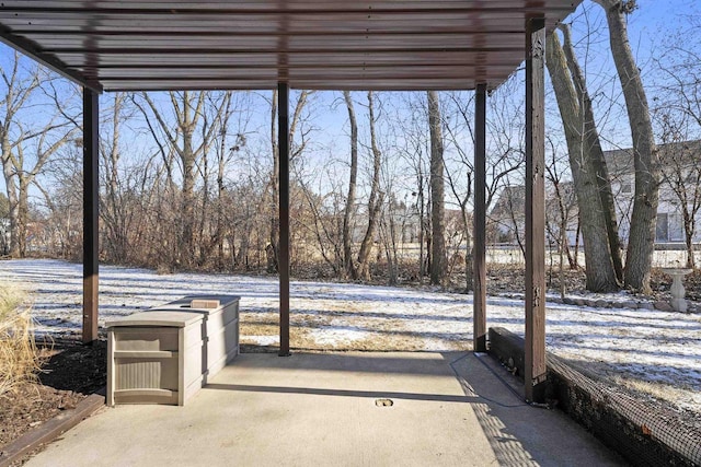 view of snow covered patio