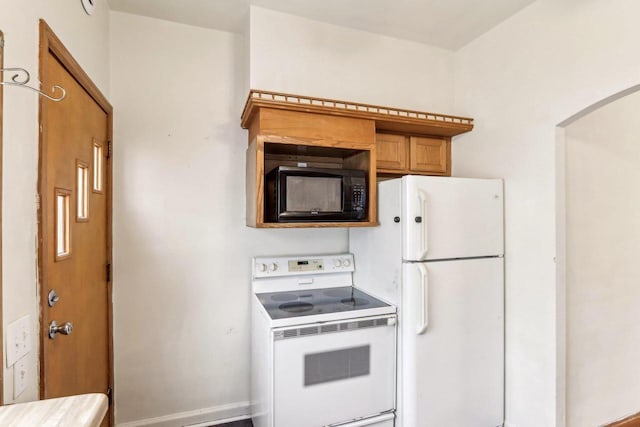 kitchen with white appliances