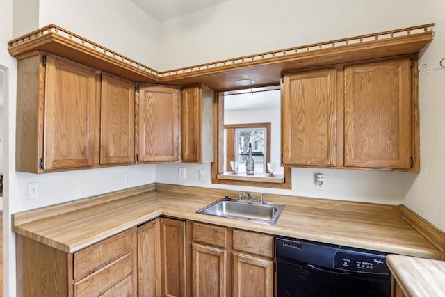 kitchen featuring black dishwasher and sink