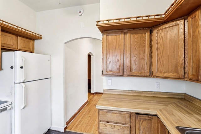 kitchen featuring white fridge