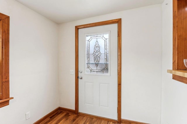 entrance foyer featuring hardwood / wood-style flooring