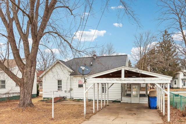 view of front of home featuring a carport