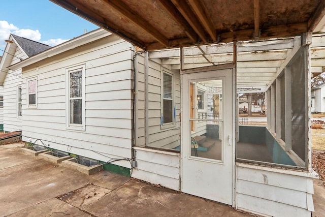 view of property exterior featuring a patio area