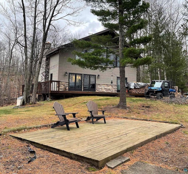 view of yard with a wooden deck