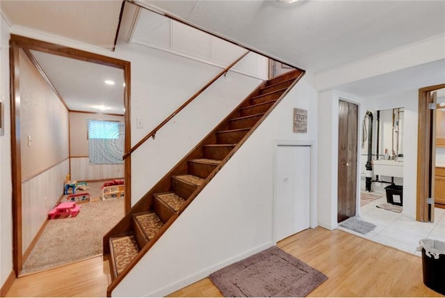 stairway with wood-type flooring