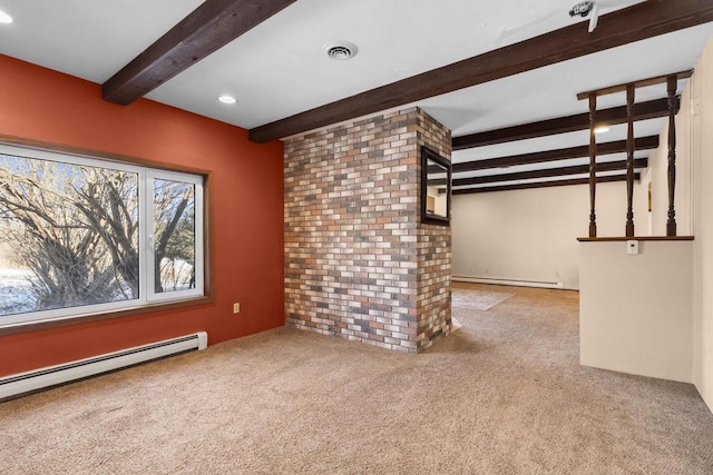 interior space featuring a baseboard heating unit and beam ceiling