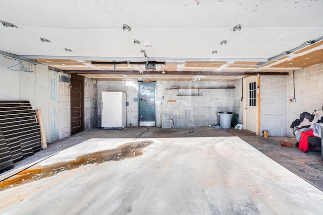 garage featuring white refrigerator