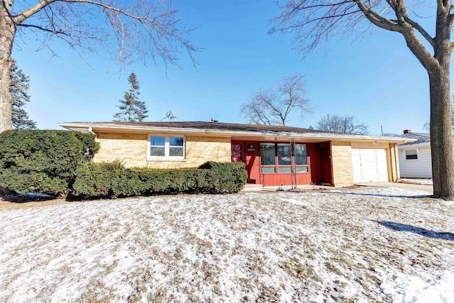 single story home with a garage