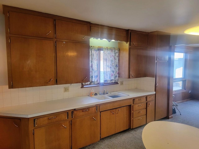 kitchen with backsplash and sink