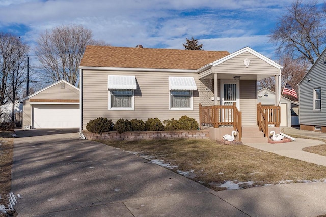 view of front of house featuring an outbuilding and a garage